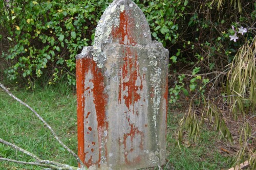 house-gravestone-at-side